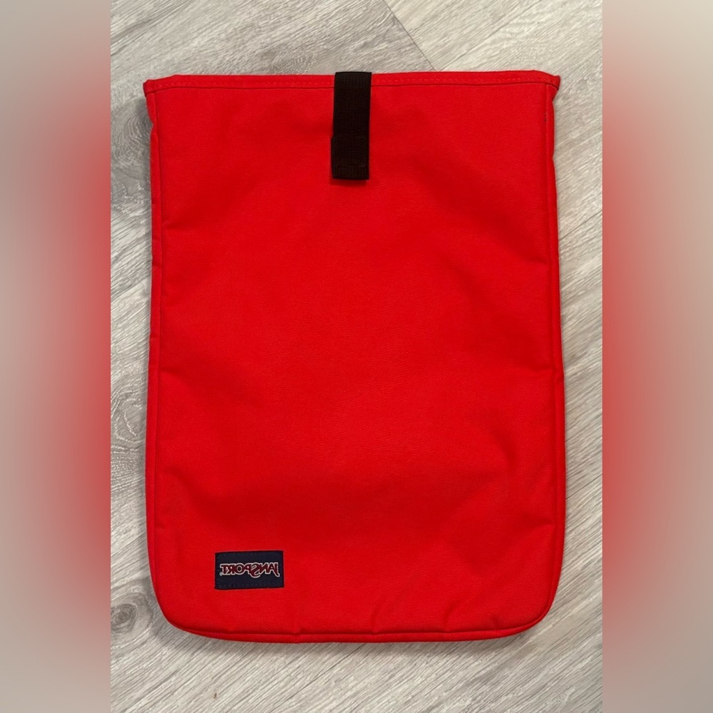 Jansport 15" LAPTOP SLEEVE - High Risk Red
Protective plush lined